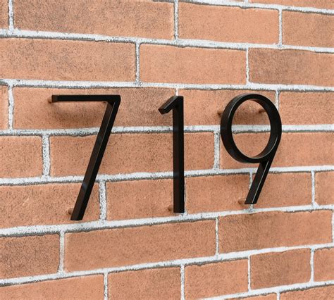 house numbers metal black floating on brick wall|installing house numbers on masonry.